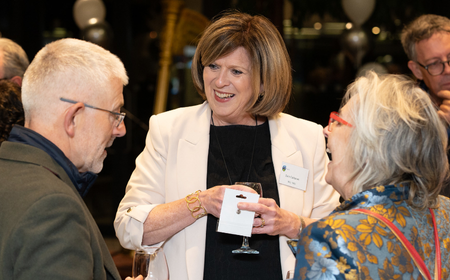 UCD alumni chatting during the UCD Law Milestone Reunion.